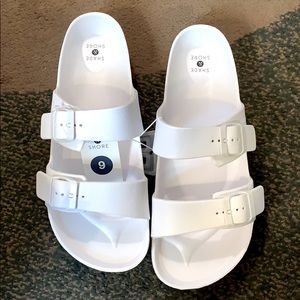 Woman’s two white band sandals